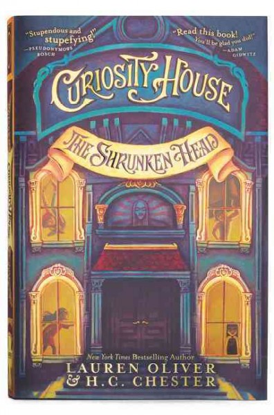 Book cover of The Shrunken Head by Laruen Oliver and H.C. Chester