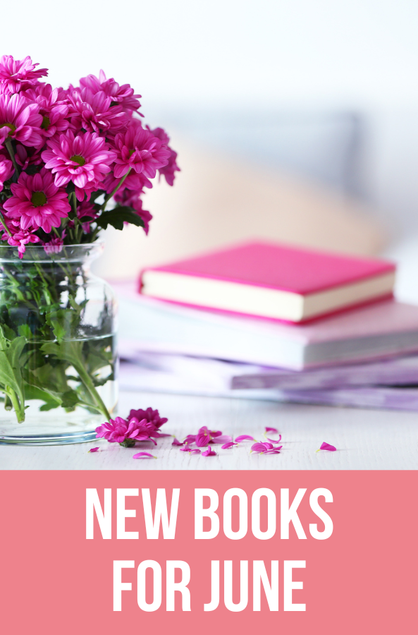 new books for june with flowers and a stack of books
