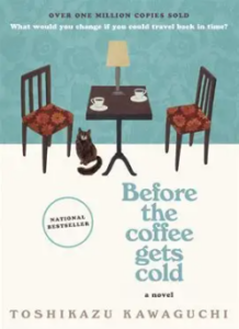 Front cover of Before the Coffee Gets Cold, showing a simple illustration of two chairs at a small table where there are two cups of coffee and a lamp; a black cat sits underneath the table