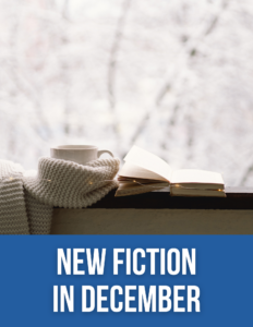 new fiction in december with a mug scarf and open book on a windowsill on a snowy day