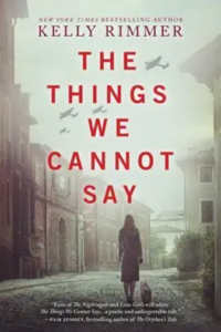 Front cover of The Things We Cannot Say showing a sepia-tones photo of a woman walking down a cobbled street, between abandoned 2-story buildings, with a small dog at her side and military aircraft overhead