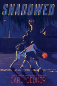 Book jacket featuring two people in shorts playing basketball