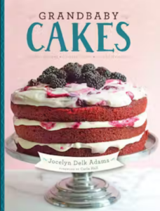 Front cover of Grandbaby Cakes showing a three-layer cake on a pedestal platter against a light pink background