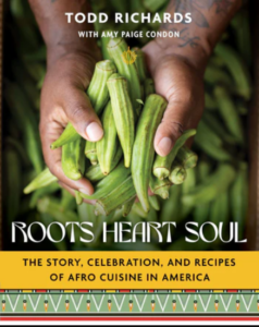 Front cover of Roots Heart Soul showing a photograph of a Black person's hands lifting handfuls of fresh okra from a basket of the produce