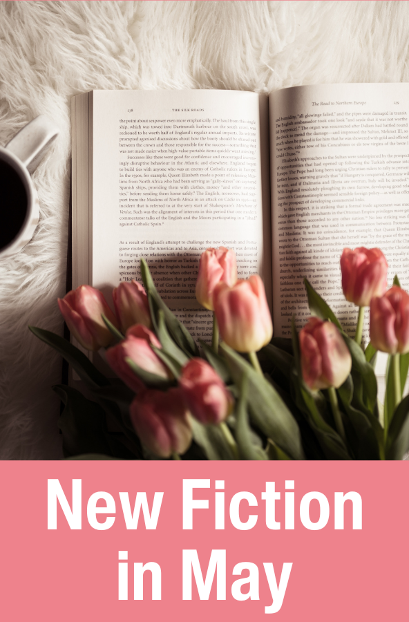new fiction in may with pink tulips on an open book on a white fur background