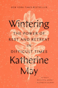 Front cover of Wintering showing the outline of an oak leaf on an orange background