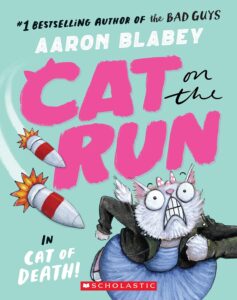 Image of cartoon cat wearing a purple dress and black coat running away from two rockets.