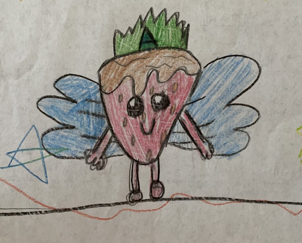 Crayon drawing of a smiling red strawberry with arms and legs. It also has a green unicorn horn and blue fairy wings.