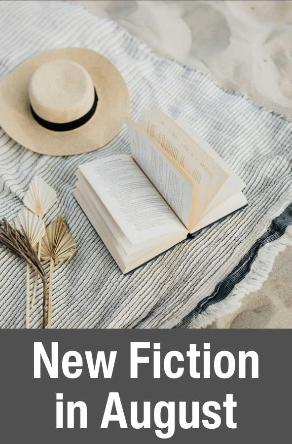 new fiction in august with an open book on a blanket on the beach