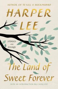 Book cover with stylized black tree branches and gold text on a light background, with subtitles mentioning stories, essays, and an introduction.