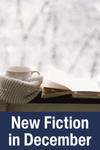 Mug and open book on a windowsill with knit blanket and snowy trees; text overlay says “New Fiction in December.”.