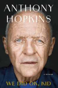 Close-up of an older man with blue eyes, gray hair, and a gentle expression on the cover of a memoir.
