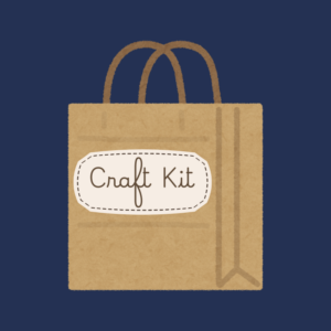 Brown paper bag with handles and a ribbon, labeled "Craft Kit," displayed against a dark blue background.