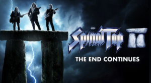 Three guitarists stand on a massive stone structure resembling Stonehenge with dramatic lightning splitting the dark sky in the background, shown on a book or media cover.